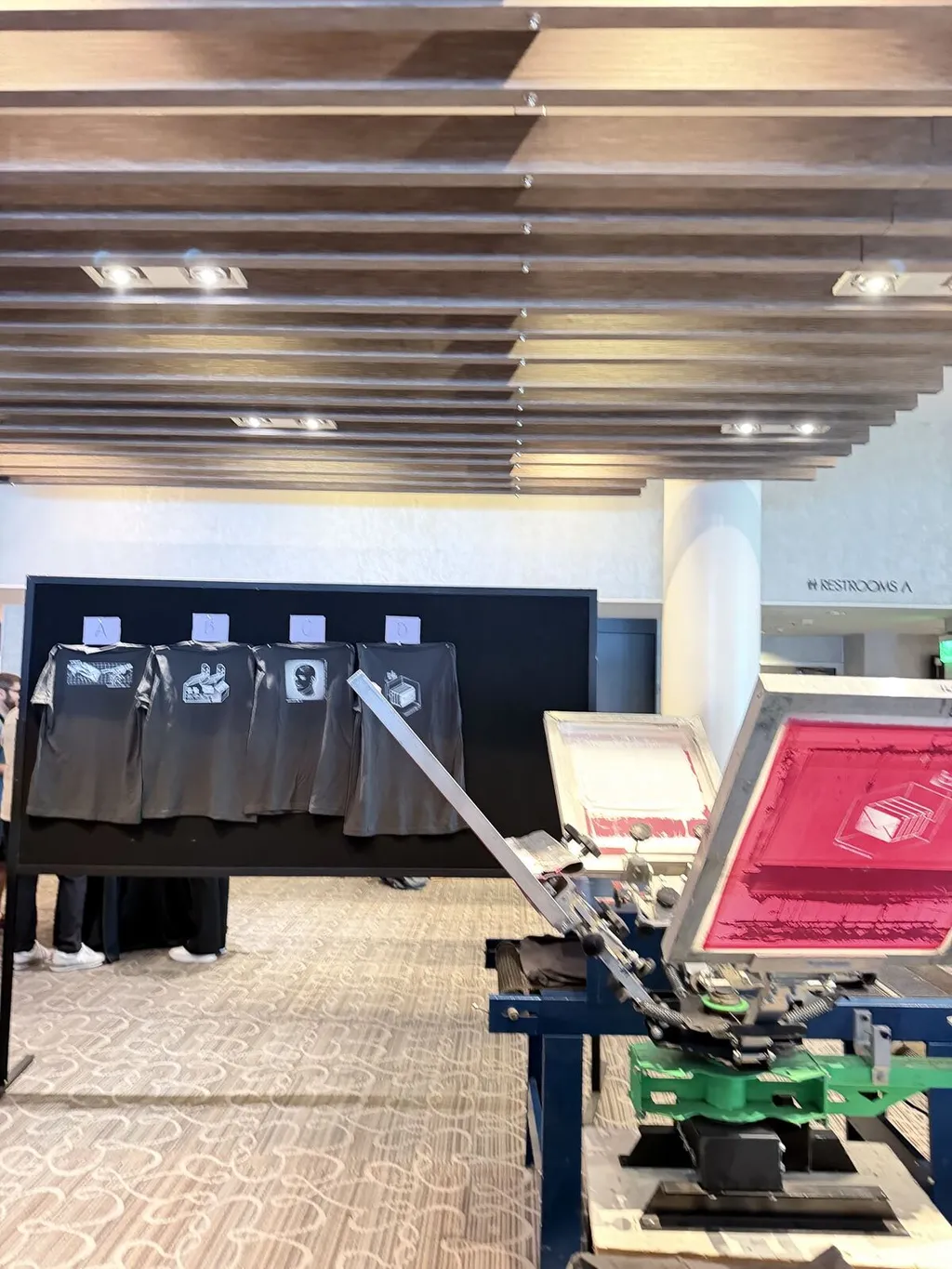 Screen printing press packed down in an event hall after the activation